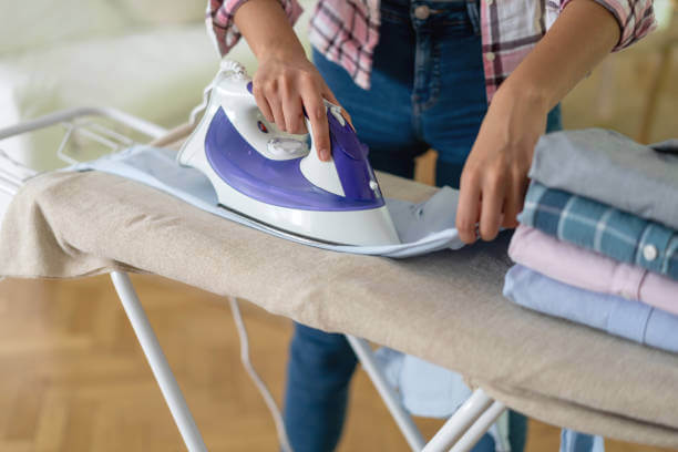 Lady doing her daily mobile laundry business in a neat setup